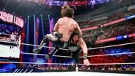 After connecting with a Spear on Rollins, Reigns feels like he has the WWE Championship in his hands.